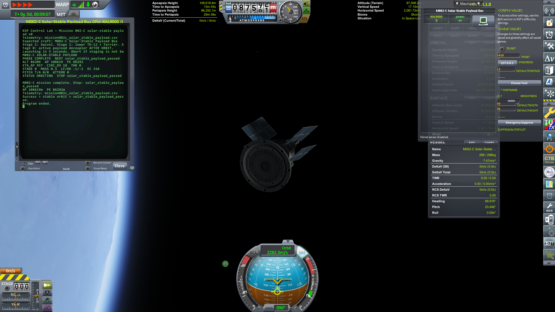 M002-C Solar-Stable Payload Bus in Kerbin orbit with solar panels deployed. The kOS terminal shows the mission passed with stable orbit and EC rising to 310.